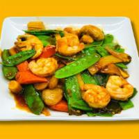 Shrimp With Snow Peas · Shrimp, sliced bamboo shoots, baby corn, water chestnuts, white onions, snow peas, mushrooms...