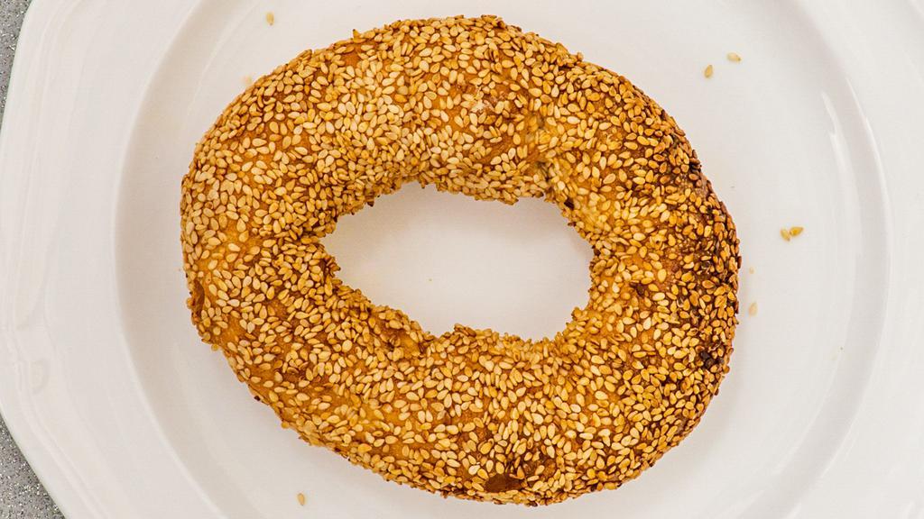 Simit · Simit is maybe the most popular street food in turkey. It is a circular bread coated in light pekmez, (molasses) and covered in sesame seeds imported from turkey. Generally served plain or for breakfast with tea, and white cheese.
