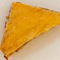 Walnut Baklava · This traditional triangle baklava has many layers. The top layers are very crunchy while the...