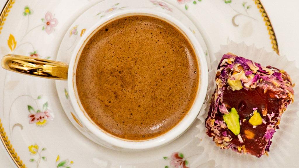 Turkish Coffee 8 Oz · Very fine coffee grounds boiled with water without a filter. It is thicker and it has coffee grounds on the bottom.Serving w/Turkish delight