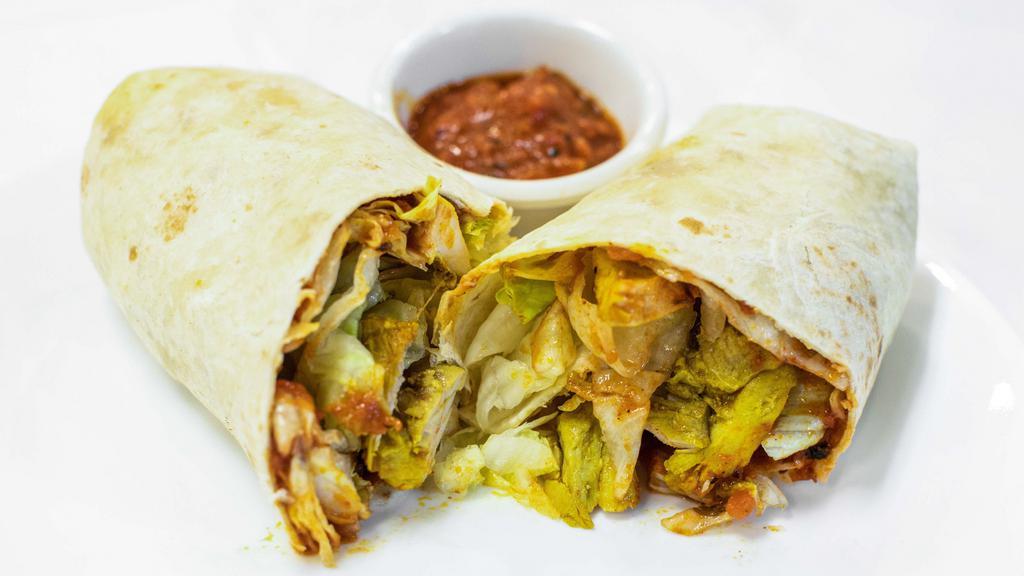 Chicken Wrap · Grilled chicken wrapped in tortilla with iceberg lettuce and cheese.