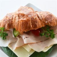 Turkey Croissant · Our famous turkey croissant, with Havarti cheese and turkey.