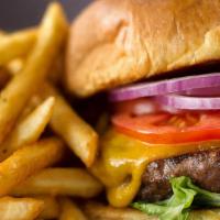 House Burger · 8oz steak burger, cheddar cheese, lettuce, tomato, onion, pickle, brioche bun, choice of side
