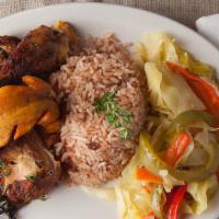  Jerk Chicken Dinner · Most popular. Served with your choice of rice , cabbage and plantain.  May substitute one si...