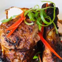 Large Jerk Chicken Dinner · Most popular. Served with your choice of rice , cabbage and plantain.  May substitute one si...