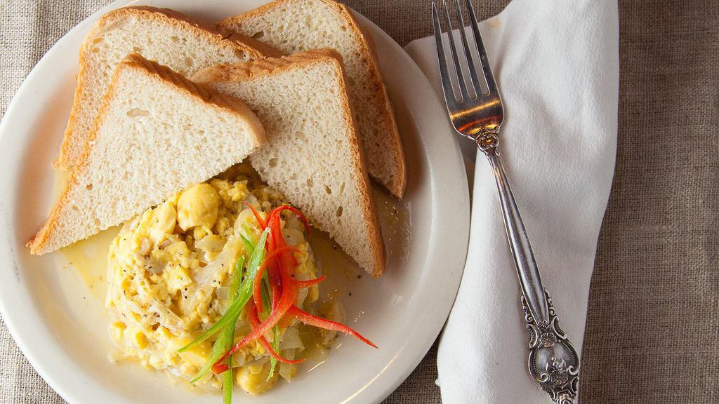 Ackee & Saltfish · Ackee and saltfish served with your choice of white rice or rice and peas.