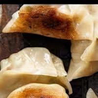 Hanoi'S Style Dumpling · Fried dumplings with pork filling.