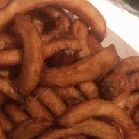 Seasoned Curly Fries · Specially seasoned crispy and golden curly fries.
