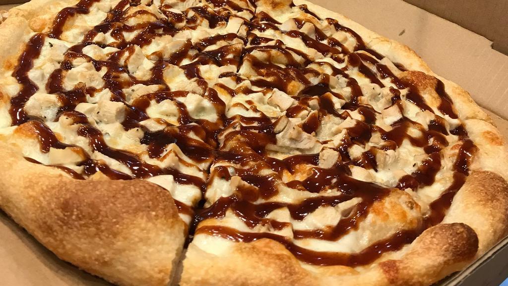 Bbq Chicken Pizza · Joe's homemade Bbq sauce on a thin crispy crust topped with tender grilled chicken, red onions and mozzarella. Served with thin crust.