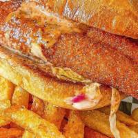 Catfish Dinner · Two catfish fillets, served with fries and a side. Your choice of heat. Swap fries for a sid...