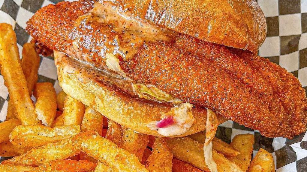 Catfish Dinner · Two catfish fillets, served with fries and a side. Your choice of heat. Swap fries for a side for additional price.