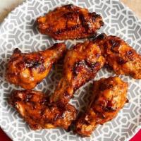 Peri-Peri Wings · Six of our star treats. Marinated for 24 hours and flame-grilled to order.