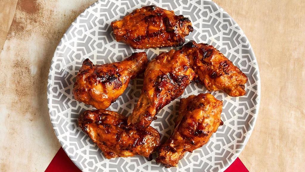 Peri-Peri Wings · Six of our star treats. Marinated for 24 hours and flame-grilled to order.