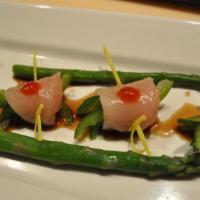 Yellowtail Jalapeño (4) · Four pieces of yellowtail sashimi with thinly sliced jalapeños and special house sauce.

The...