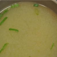 Miso Soup · Soft tofu, seaweed and scallion soup in soy broth.