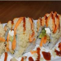 Lisa Crunch Roll · In: shrimp tempura, cream cheese, and avocado. 

Out: crunchy flakes, spicy mayo and eel sau...