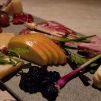 Cheese & Charcuterie Board · chef's selection of 3 meats and 3 cheeses, paired with a seasonal variety of fruit and condi...