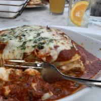 Lasagna · Italian sausage ragu, marinara, bechamel, herbed ricotta, provolone, mozzarella