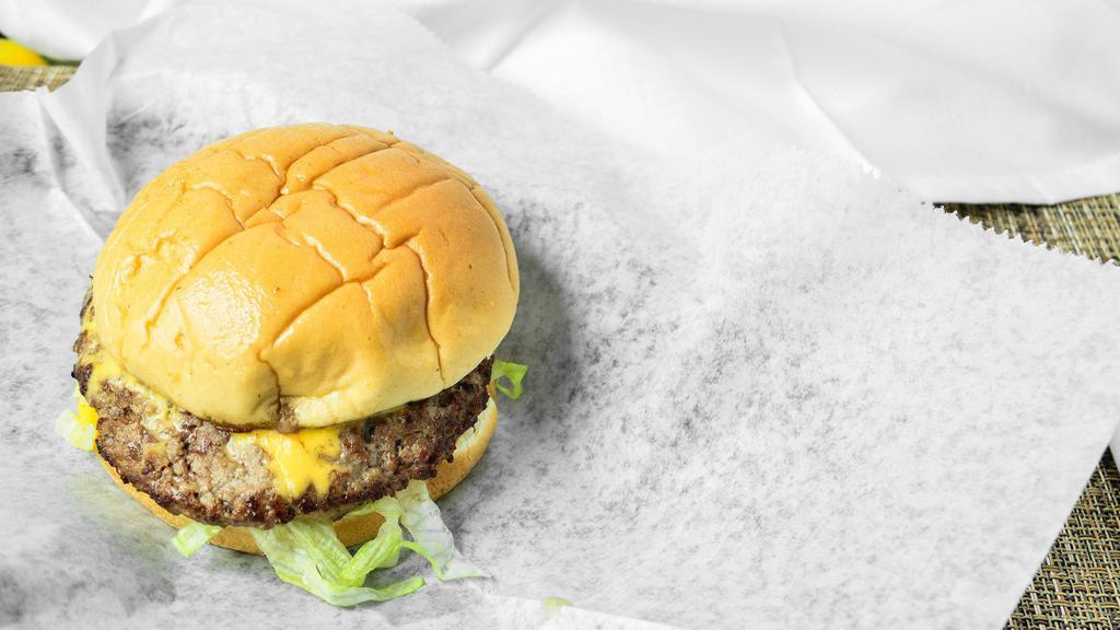 1/3 Lb. Cheeseburger · All burgers served with mustard, pickles, onions, lettuce, and tomatoes. Burgers cooked medium-well (155 degrees). USDA Ground Beef Delivered Fresh Daily.