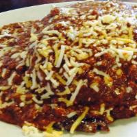 Sausage Chili Cheeseburger · Oklahoma’s Best Burger. Smothered in Chili!  Ron's Sausage Cheeseburger with the onions frie...