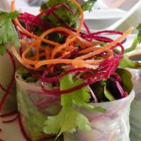Asparagus Rolls · shrimp, asparagus, carrots, beets and lettuce with spicy garlic sauce.