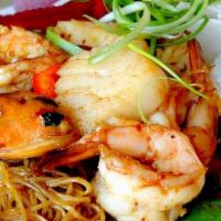 Spicy Seafood Noodles · shrimp, scallops, calamari, mussels,. egg noodles, basil leaves, peapod, red bell peppers, j...
