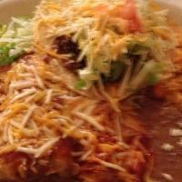 Enchilada Dinner · (3) Meat rolled in tortillas then smothered in one of our home
style sauces: Roja, Verde, Mole