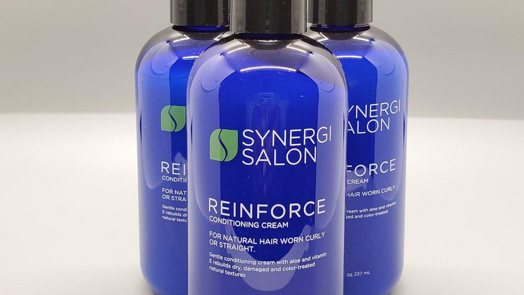 Synergi Reinforce Thermal Protect Conditioning Cream · 8 oz. Gentle conditioning cream with aloe and Vitamin E rebuilds dry, damaged and color-treated natural textures. Nutrients and proteins essential for healthy hair will be sealed into the hair shaft’s sensitive cuticle. The result will be smooth, radiant, manageable hair protected from the damaging effects of heated styling appliances. 
Directions: After shampooing hair with Reinforce Shampoo or Renew Shampoo, apply and distribute a small amount of product evenly through hair. Leave conditioner in for one minute for moderate conditioning or for up to five minutes for deep conditioning. Rinse completely from hair until water runs clear. Style as desired.
