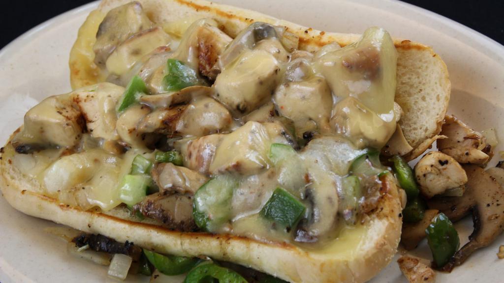 Philly Melt · Choice of chicken or steak, green pepper, grilled onion, mushrooms swiss on hoagie
(chicken philly pictured)