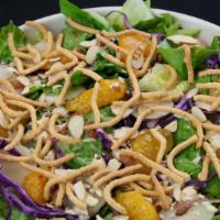 Asian Salad · Greens, shredded cabbage, water chestnuts, mandarin oranges, toasted almonds, chow mein nood...