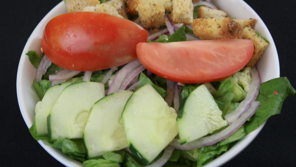 Garden Salad · Greens, tomatoes, cucumbers, red onions, croutons.