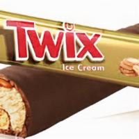 **Twix Ice Cream Bar · Creamy vanilla ice cream, gooey caramel, and the great cookie crunch of Twix® bars covered i...
