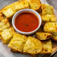 Garlic Bread With Cheese · Served with marinara sauce.