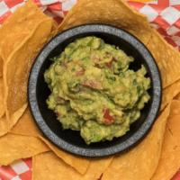 Queso & Guac · Vegetarian option available. Fresh made guacamole and queso Blanco. Served with tortilla chi...