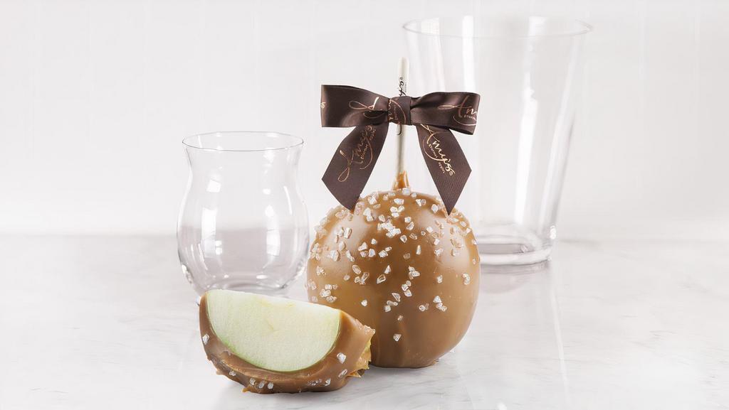 Sea Salt Caramel · A jumbo granny smith apple hand dipped in our signature kettle-cooked caramel, and then sprinkled with our sea salt blend.
