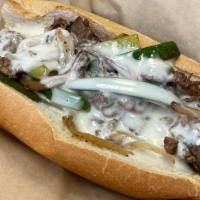 Cheesesteak · Sirloin steak, caramelized onions, peppers, provolone or cheese whiz.