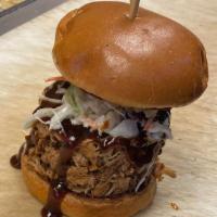 Bbq Pulled Pork · Pulled pork, coleslaw, fried onion ring, and honey brioche bun.