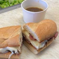 Market Dip · Beef brisket, provolone cheese, au jus, and Cuban loaf.