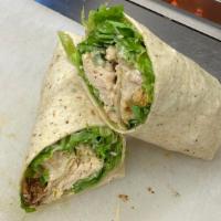 Grilled Chicken Caesar Wrap · Romaine, parmesan, croutons, and creamy Caesar dressing.