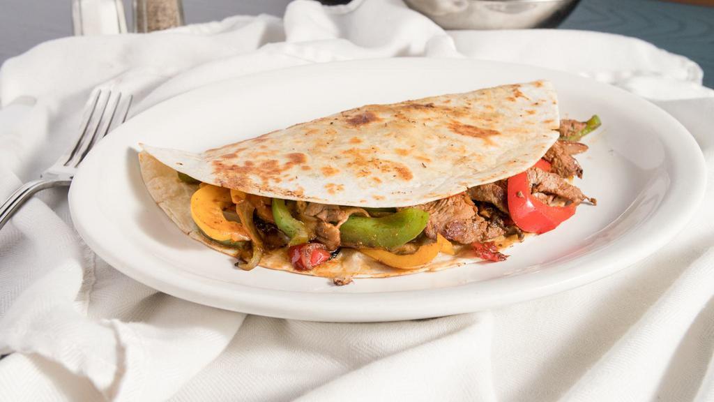 Fajita Quesadilla · Choice of steak, chicken, shrimp or veggie with grilled peppers, onions, tomatoes, mushrooms inside a cheese quesadilla. Served with mexican rice, refried beans, lettuce, sour cream, and pico de gallo.