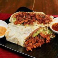 Burrito Normal · Tortilla de harina, frijoles, arroz, carne, lechuga, pico de gallo, queso, crema. / Flour to...