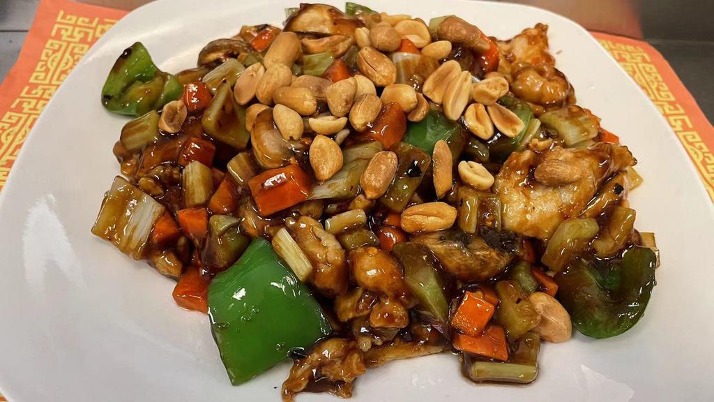 Kung Pao Chicken (Spicy) · Bell Pepper,  mushroom , carrots and celery with spicy Kung Pao sauce (peanut on the top)