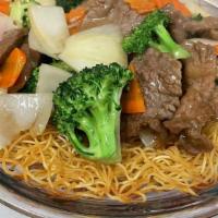 Beef Pan Fried Noodle · Broccoli, carrots, white onion with Flank Steak top of Pan Fried Noodle.....