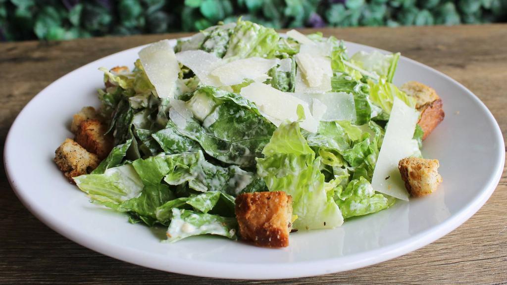 Caesar Salad · romaine, house Caesar, shaved parm, sourdough croutons.