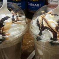 Italian Affogato · 2 shots of espresso, 2 scoops vanilla Ice cream, whipped cream, caramel & chocolate sauce.