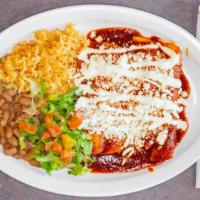 Enchiladas · Fried tortillas stuffed with choice of meat and topped with cheese, sour cream, and choice o...
