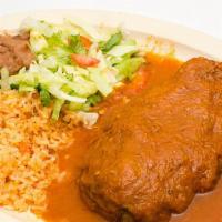 Chile Relleno · Poblano pepper stuffed with cheese. Served with rice, beans & tortillas.