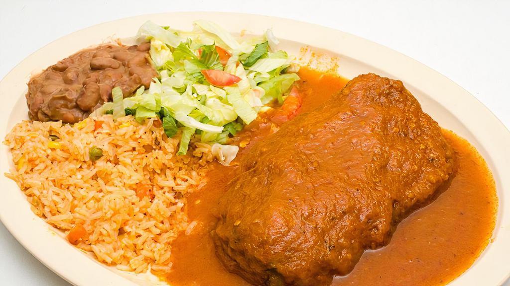 Chile Relleno · Poblano pepper stuffed with cheese. Served with rice, beans & tortillas.