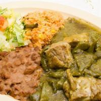 Adobo Verde · Pork meat in green sauce. Served with rice, beans & tortillas.