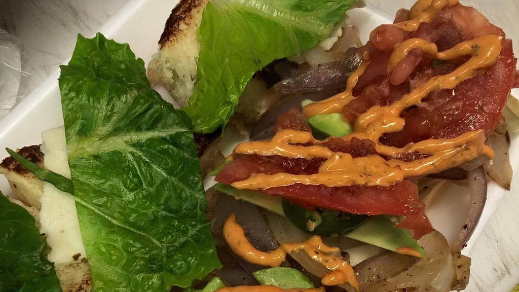 Uncle Sam · Caramelized onions, sharp cheddar seasoned tomato, green leaf lettuce and truck-made worcestershire aidli.